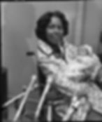 Congresswoman Yvonne Brathwaite Burke and husband presenting newborn daughter, Autumn, to reporters.